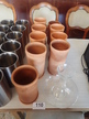 ca. 10teiliges Wein-Servier-Set bestehend aus 9 Weinkühlern aus Ton, 1 Dekanter ca. 10teiliges Wein-Servier-Set bestehend aus 9 Weinkühlern aus Ton, 1 Dekanter