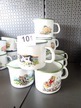 10 Stk. Emaille-Schnabeltöpfe mit div. Motiven (ohne Kunststoffwanne) 10 Stk. Emaille-Schnabeltöpfe mit div. Motiven (ohne Kunststoffwanne)
