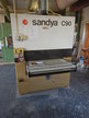 Sandya Breitbandschleifmaschine C90, mit Kalibriereinrichtung zum Schleifen von Furnierplatten, Funktionskontrolle durchgeführt, Einbandmaschine, Arbeitsbreite max. 920mm, größte Arbeitshöhe 160mm, kleinste Arbeitshöhe 3mm, Satinierwalze fest und quer ver Sandya Breitbandschleifmaschine C90, mit Kalibriereinrichtung zum Schleifen von Furnierplatten, Funktionskontrolle durchgeführt, Einbandmaschine, Arbeitsbreite max. 920mm, größte Arbeitshöhe 160mm, kleinste Arbeitshöhe 3mm, Satinierwalze fest und quer ver