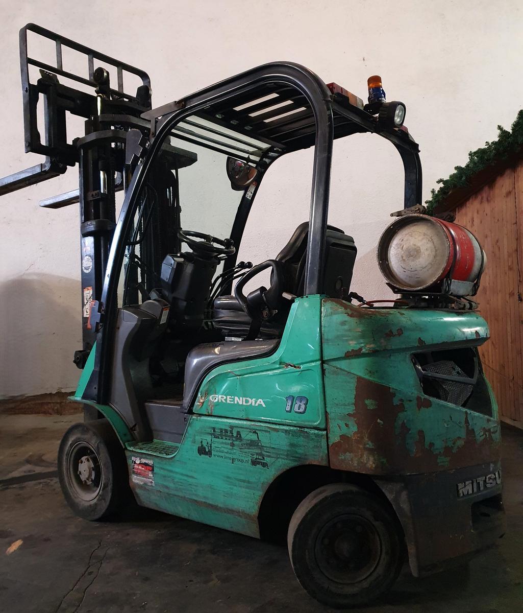 Mitsubishi FG18N Gasbetriebener Stapler / Seriennummer: EF34L-40438, Baujahr: 2007, Betriebsstunden: 16.789, Hubhöhe: 4,750 m, Tragfähigkeit: 1.750 kg, Freihubstapler, Hubgerüst: 3 hydraulische Steuerkreise, Geschwindigkeit: max. 20 km/h, Eigengewicht: 2.?d=2025-11-18 17:10:48