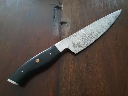 Damast-Kochmesser, Micarta-Griff schwarz, Klinge Damaszener Stahl, rund 150 Lagen, charakteristische, rustikale Schmiedeoberfläche, Gesamtlänge 310 mm, Klingenlänge 185 mm, Klingenstärke 3mm Damast-Kochmesser, Micarta-Griff schwarz, Klinge Damaszener Stahl, rund 150 Lagen, charakteristische, rustikale Schmiedeoberfläche, Gesamtlänge 310 mm, Klingenlänge 185 mm, Klingenstärke 3mm
